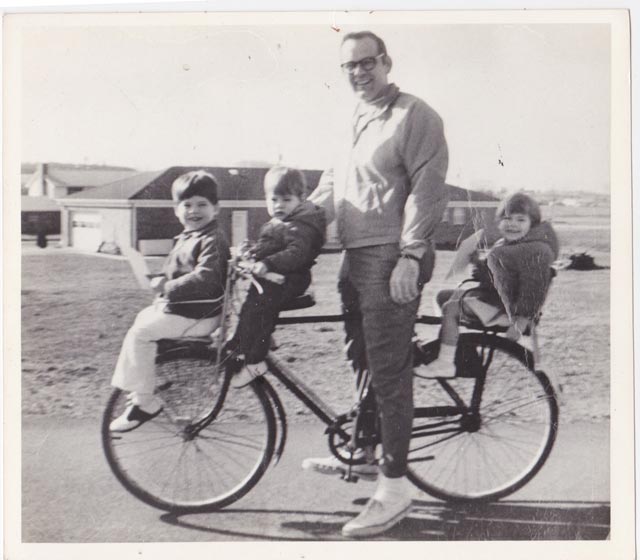 rhoden kids with our dad on a bike in the seventies