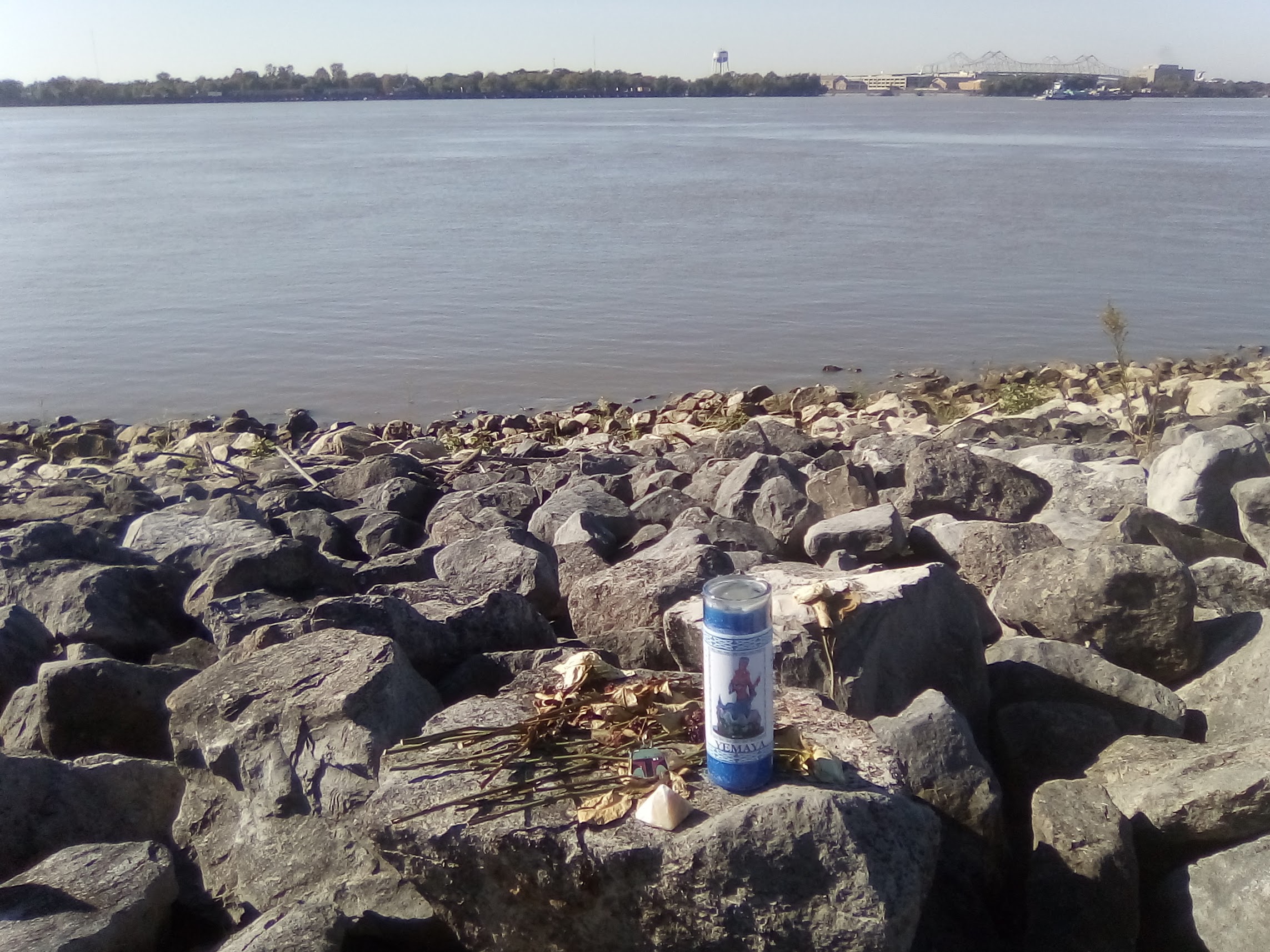 An offering on the mississippi River levee in Holy Cross, New Orleans.