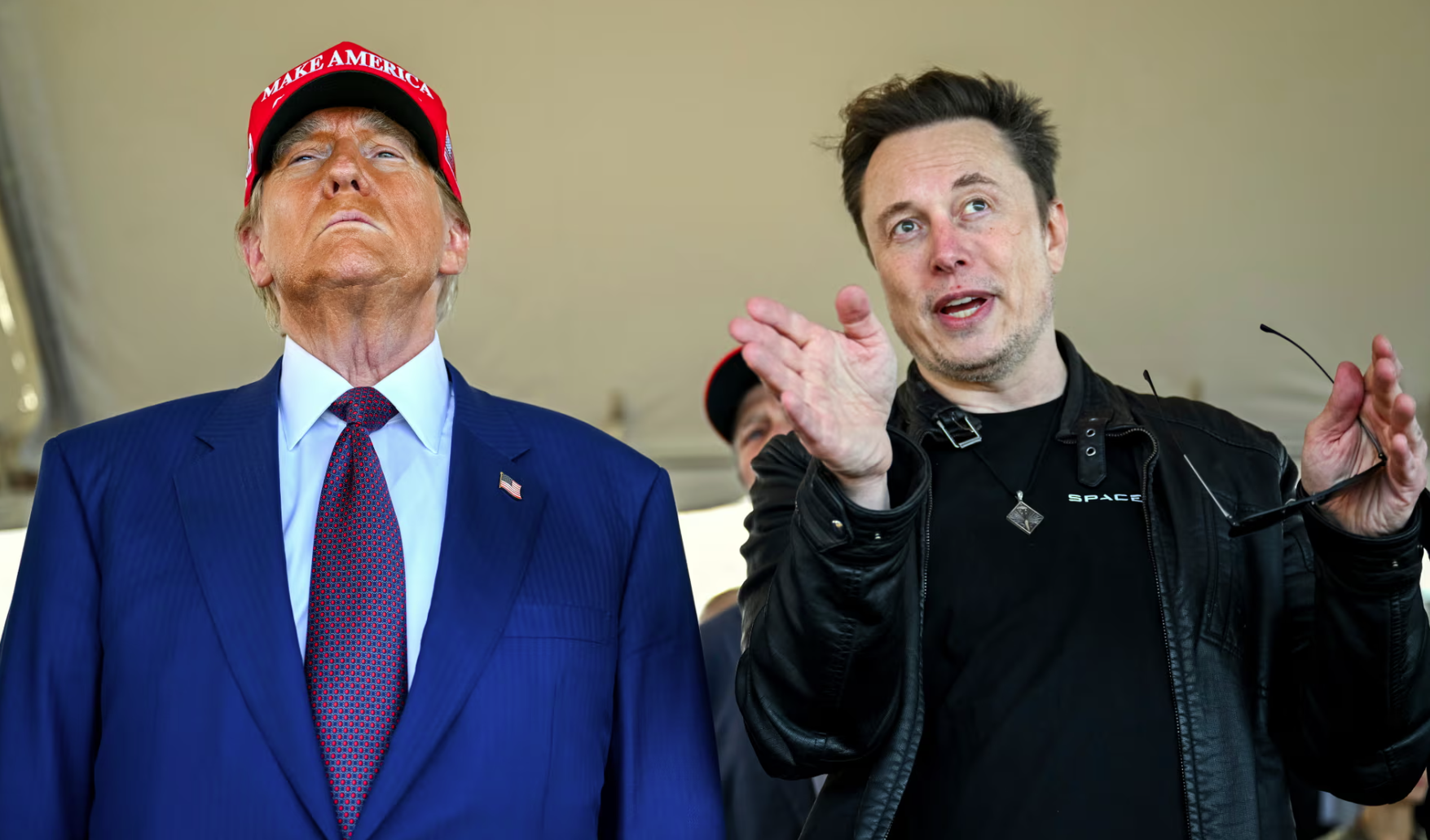 Donald Trump and Elon Musk looking like shit.