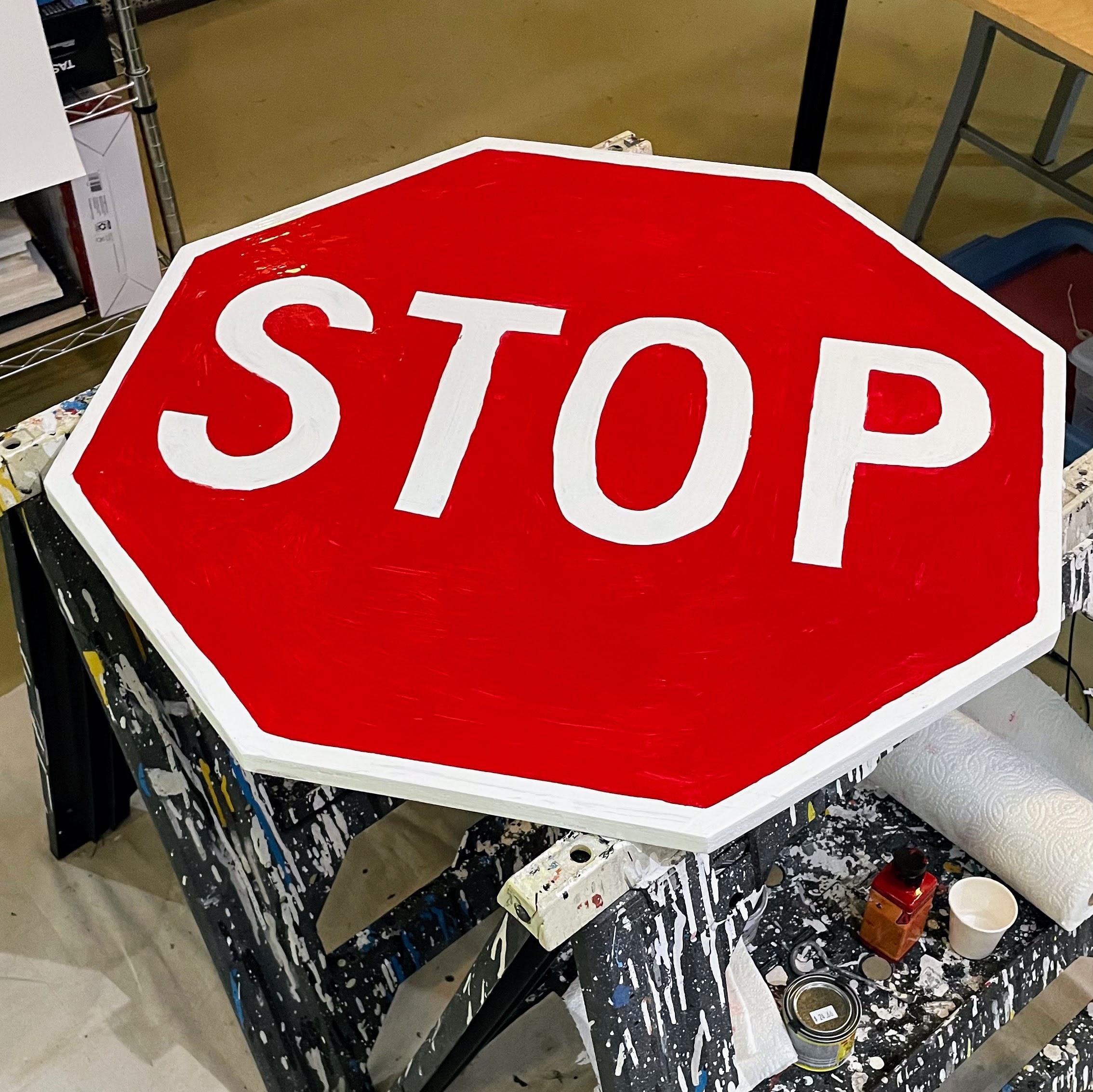 partly-completed stop sign painting by Dave Rhoden