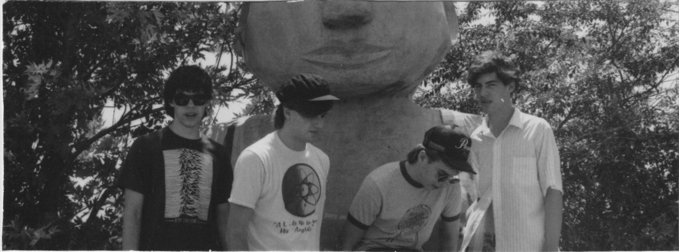 photo of Dial A Miracle conversing with the Buddha, Sir Goony's Fun Center, Chattanooga, Tennessee, circa 1984.