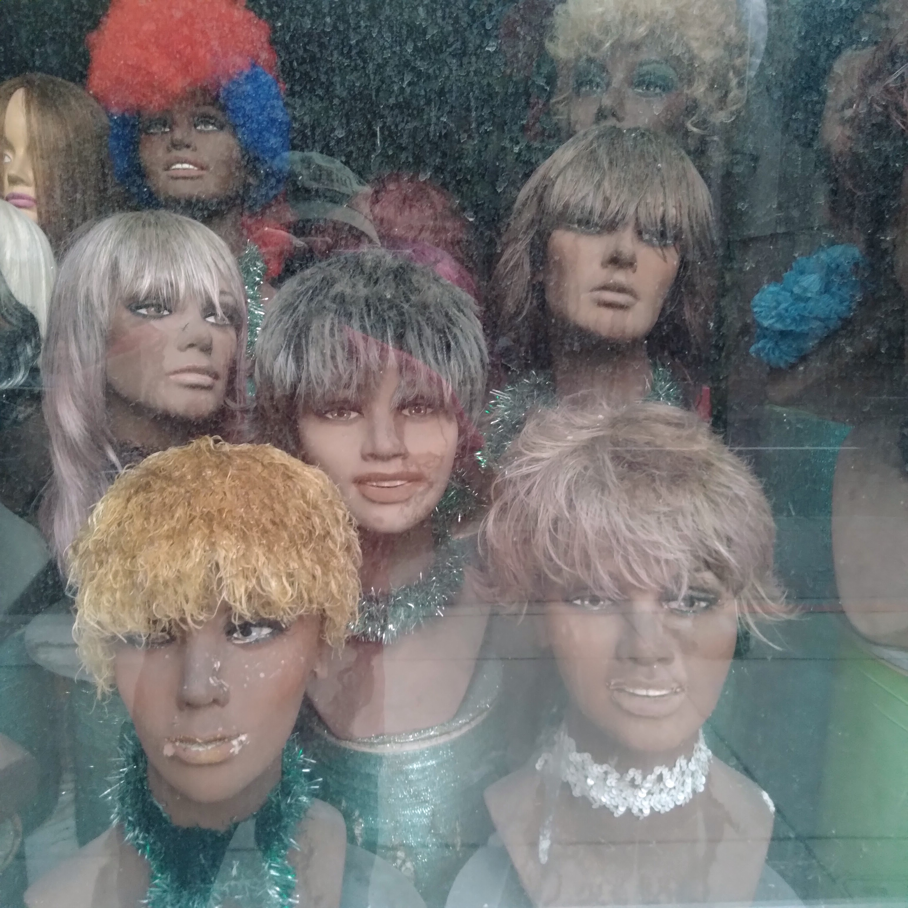 Wig shop on Market Street, Chattanooga, Tennessee, August 28, 2021. Photo by David Rhoden.