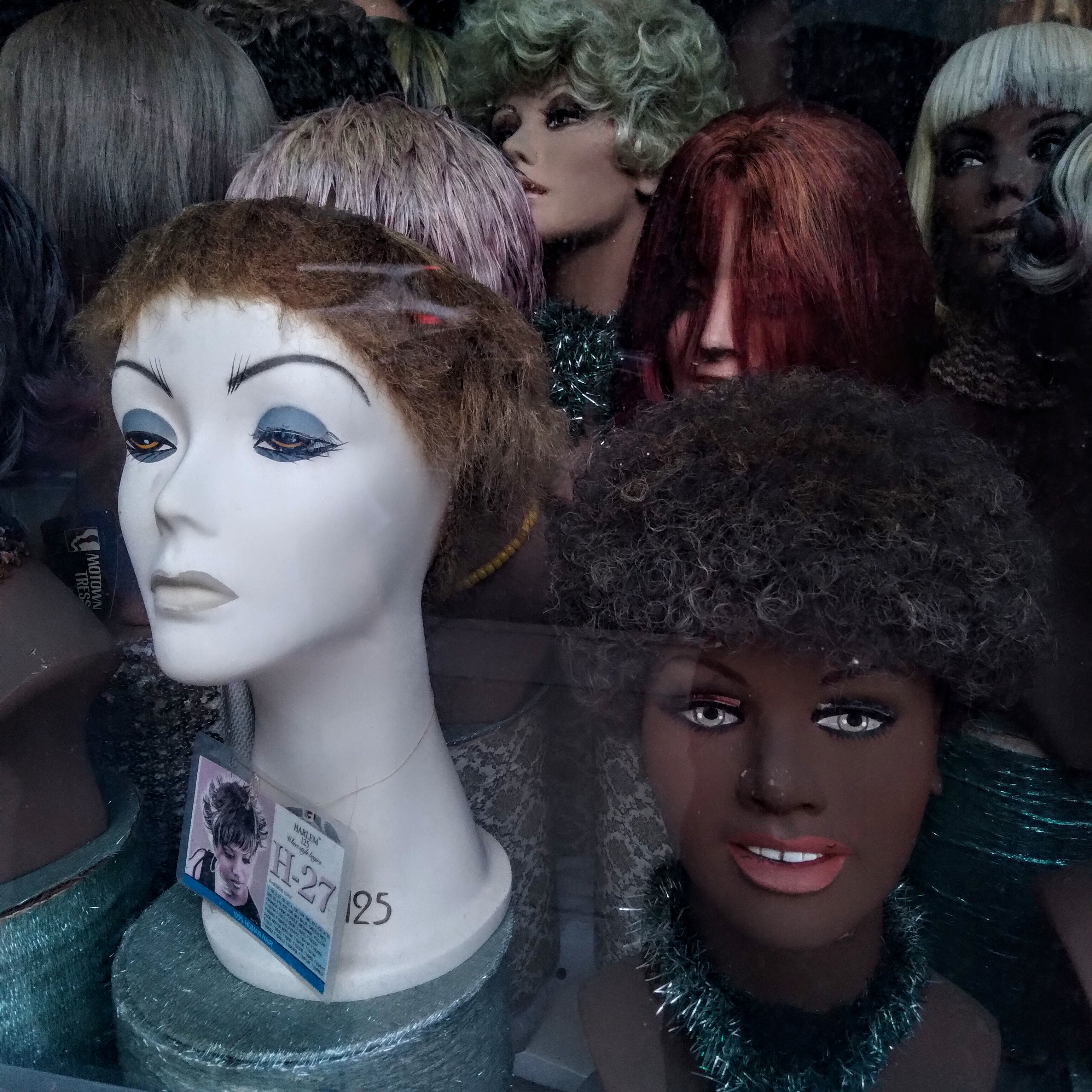 Wig shop on Market Street, Chattanooga, Tennessee, August 28, 2021. Photo by David Rhoden.