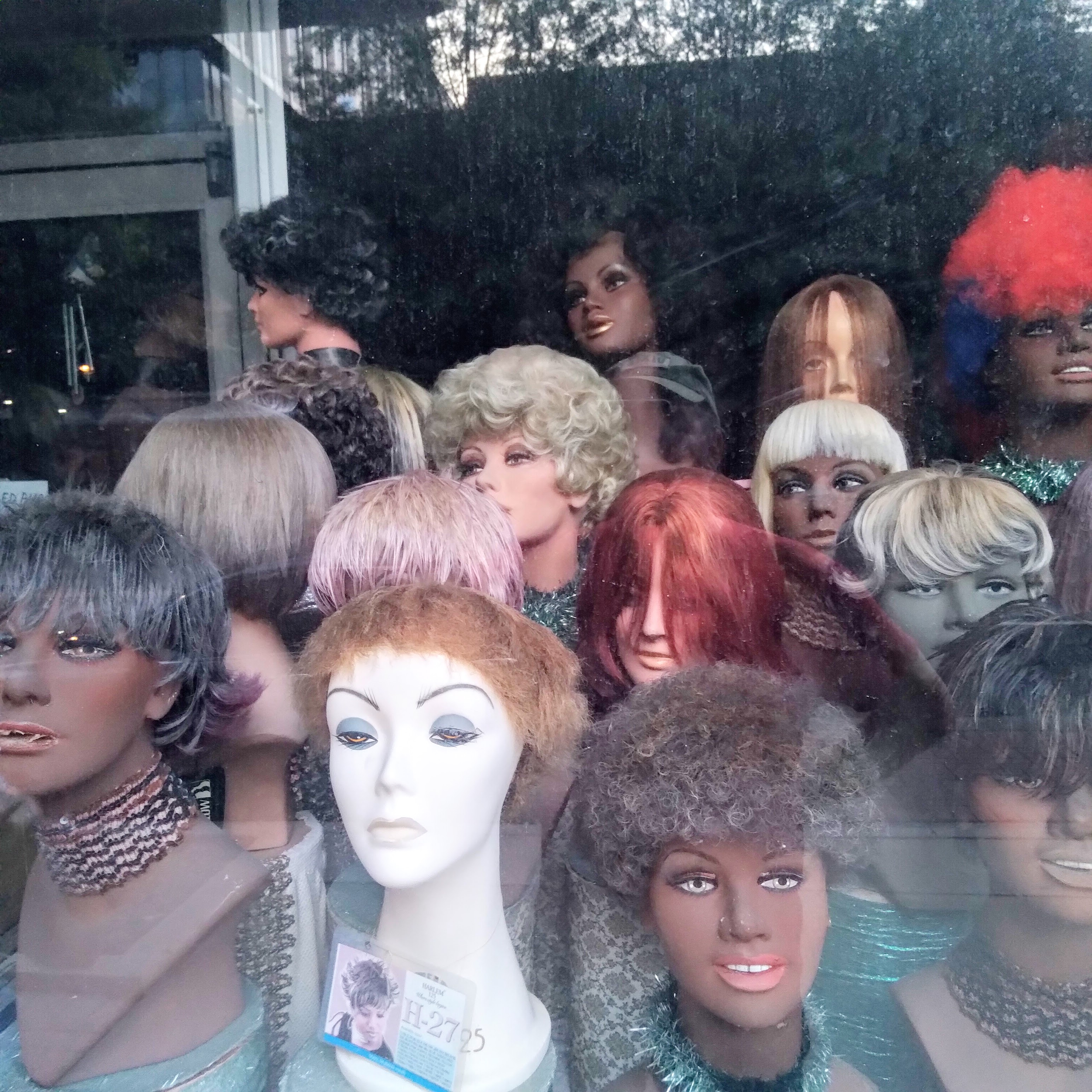 Wig shop on Market Street, Chattanooga, Tennessee, August 28, 2021. Photo by David Rhoden.