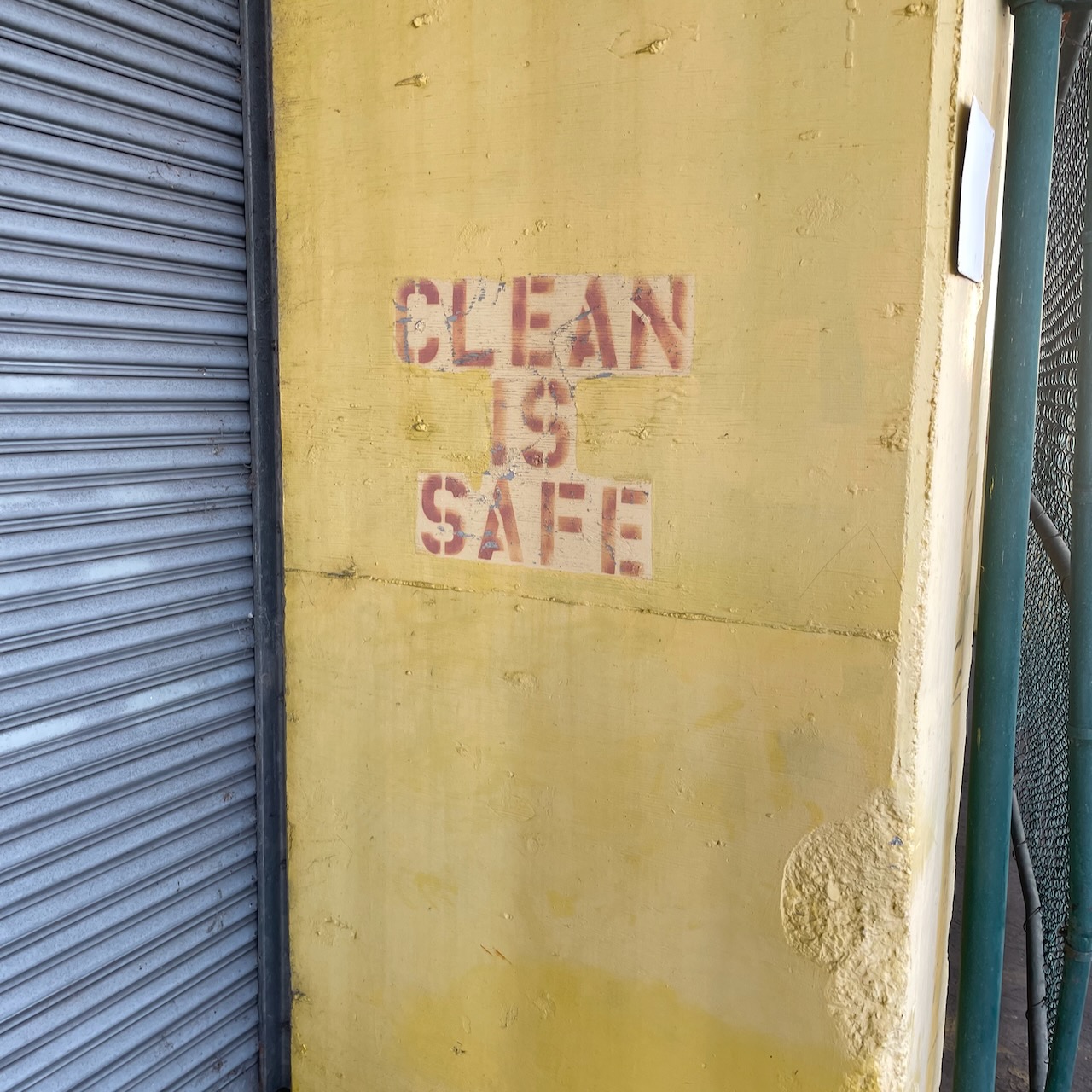 stencil saying CLEAN IS SAFE.