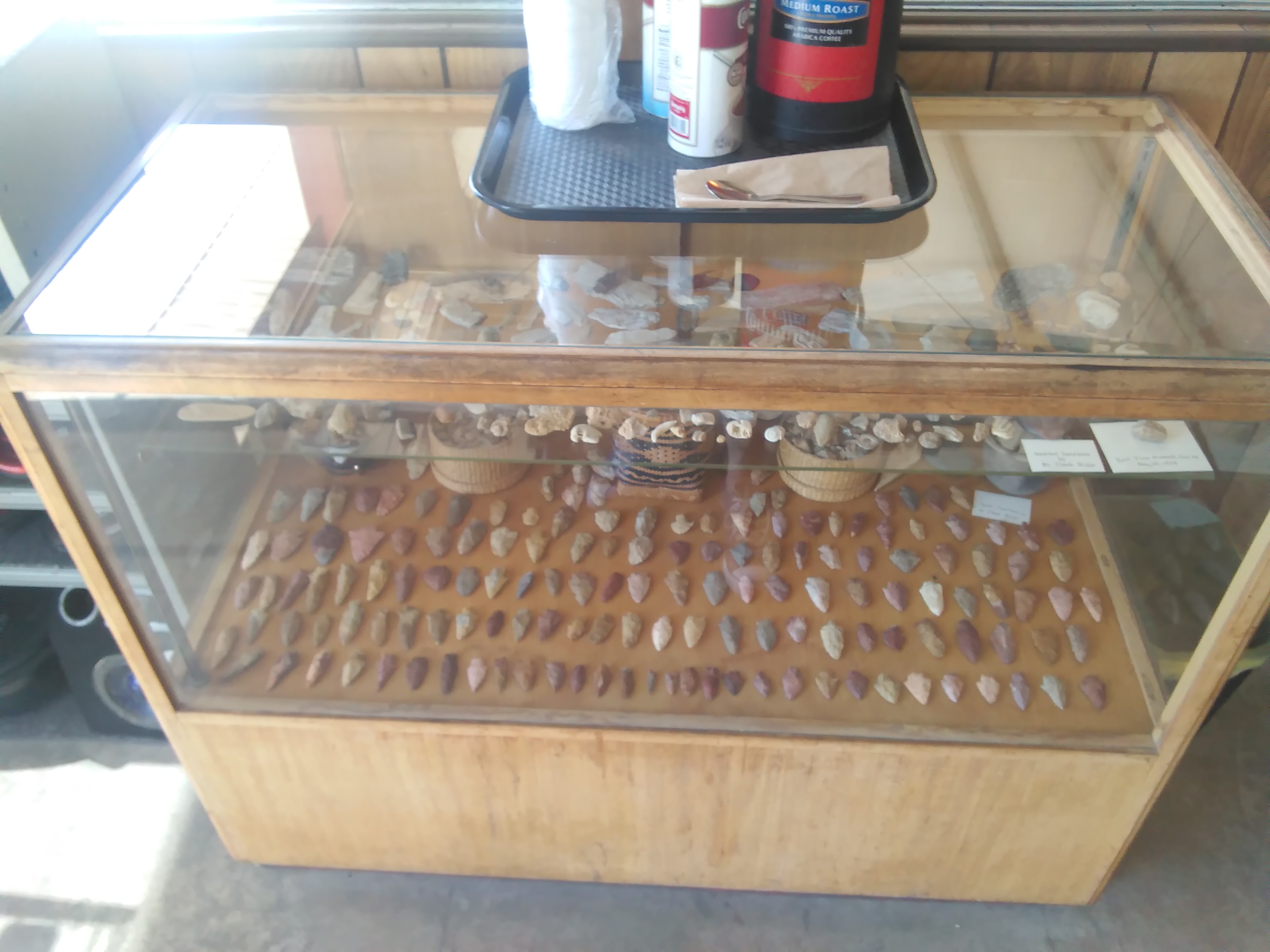 arrowheads in a vitrine at Culpepper's Automotive, Poplarville, MS