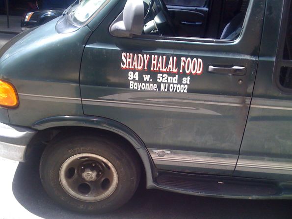 Food cart labeled "Shady Halal Food", New York City, 2010. Photograph by David Rhoden.