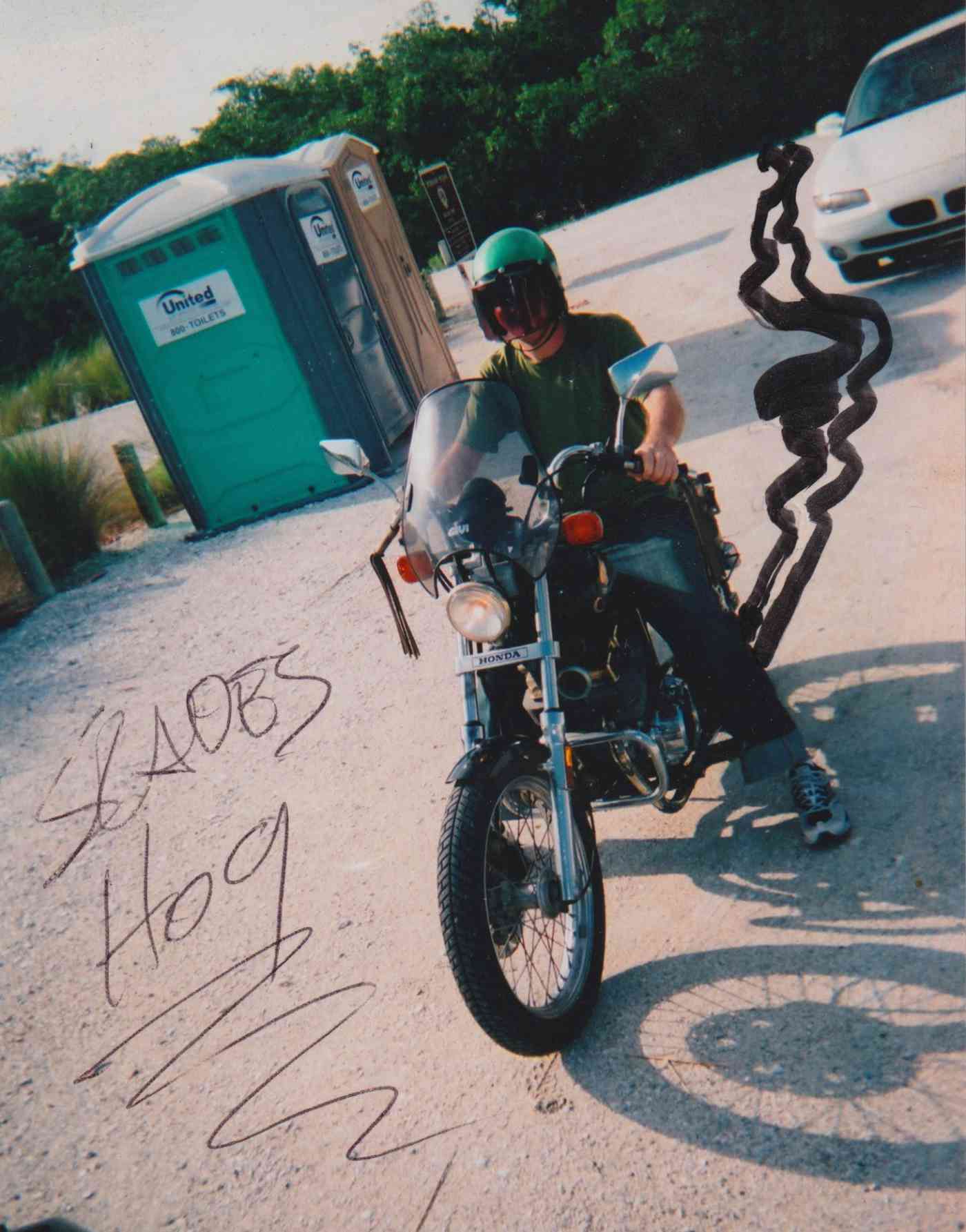 Slade's Hog: Slade Nash on a motorcycle